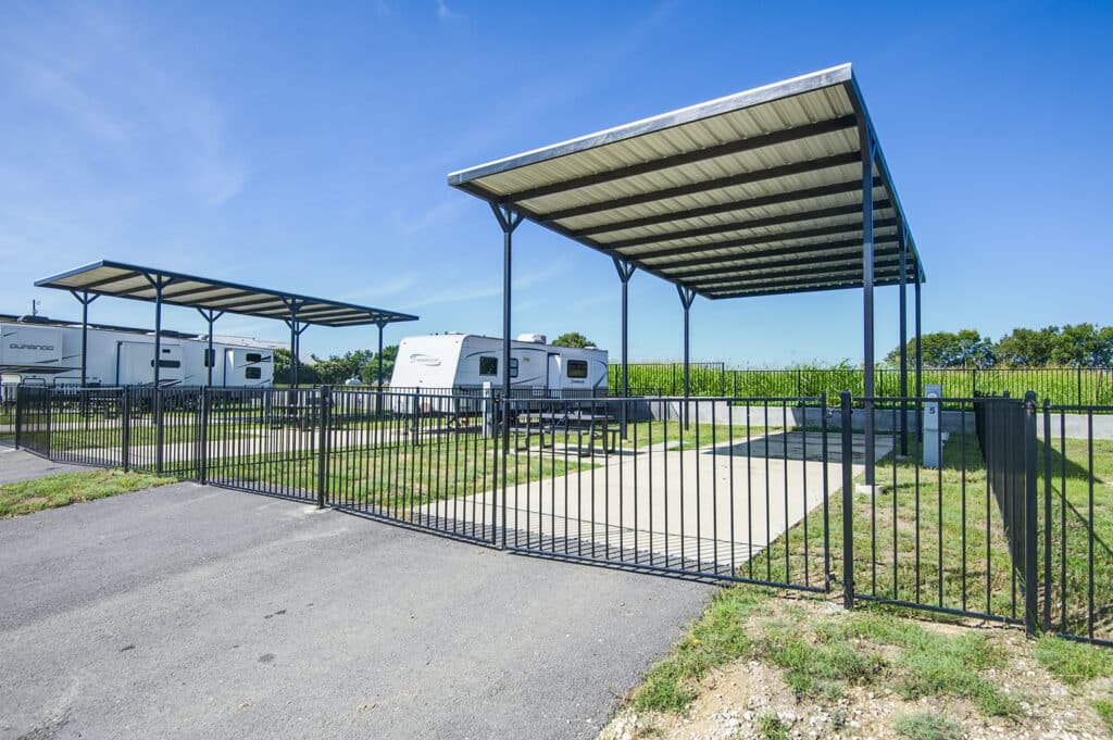 Covered RV lot at Itasca Creek RV Park in Itasca, Texas.