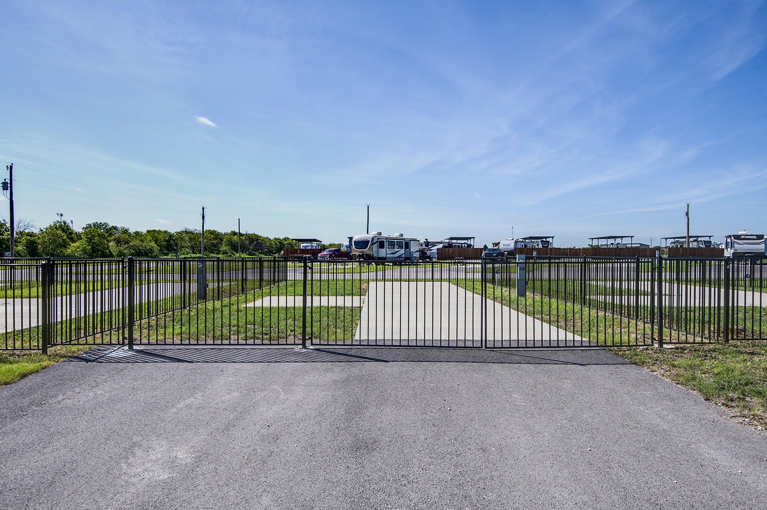 Fenced Back-In RV Sites at Itasca Creek RV Park in Itasca, TX
