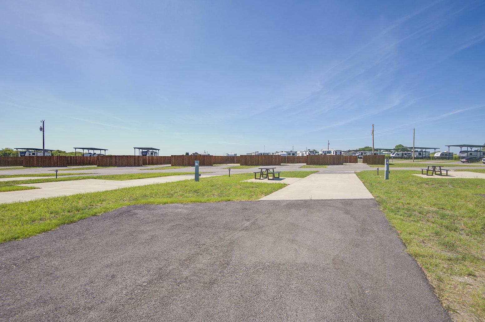 Pull-Through RV Site at Itasca Creek RV Park in Itasca, TX